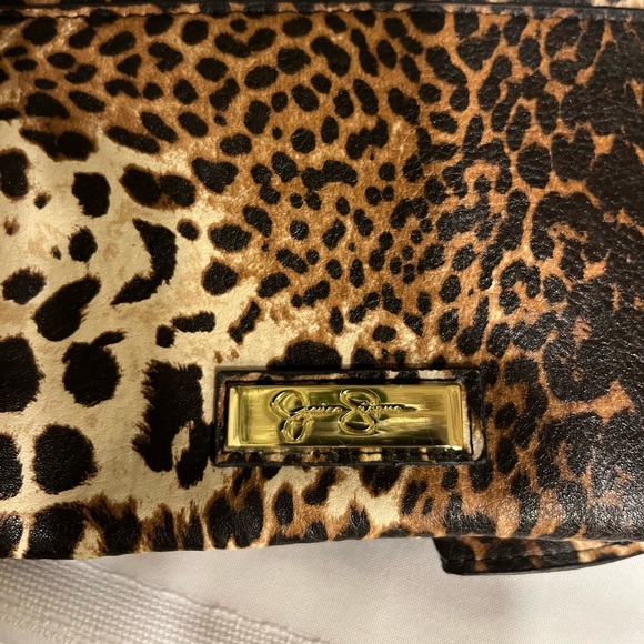 Jessica Simpson animal print clutch with gold wrist strap - Picture 3 of 4